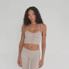 Video of Kylen Top in nude highlighting ultra-soft active fabric and racerback cut. **nude