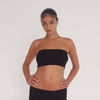 Video: Model wearing the Aili Tube in black, showing the strapless cropped silhouette and lightweight ribbed knit in motion **black