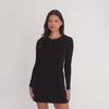 Model wearing the Niima Dress in black, showing front, side, and back views and how the soft modal fabric moves. **black