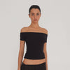 Video: Model wearing the black Solei off-the-shoulder top, showing the fit and garment details from multiple angles **black