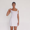 Model wearing the ARE YOU AM I Miyu Dress in white, a fitted mini dress with a scoop neckline and raw-edge detailing, shown from multiple angles.**white